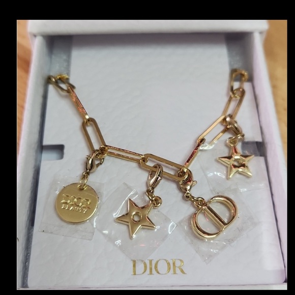 Dior Accessories - DIOR PHONE CHARM STARS LOGO VIP Limited Edition GOLD TONE METAL